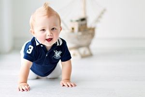 Baby with boat 300x200