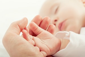 Baby Holding Hand 300x200